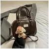 Bolsa de Mão com Relevo de Nicho Versão Coreana 2025 Inverno Nova Elegante e Fashion Bolsa de Ombro Bolsa Transversal para o Dia a Dia
