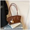 Bolso de mujer 2025, nuevo y popular, bolso de hombro explosivo Super Fire, bolso de hombro de alta gama, estilo nicho, para ir al trabajo.