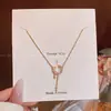 Exquisito Collar de Acero de Titanio de Alta Gama con Estrella y Luna de Circonio para Mujer, Cadena para Clavícula Sencilla y Moderna Versátil Accesorio de Cadena para el Cuello
