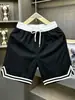 Shorts de corte holgado, con bloques de color, de longitud hasta la rodilla para hombre, nuevo estilo de verano, transpirables y de secado rápido, adecuados para correr, deportes, baloncesto, entrenamiento y fitness