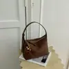 Bolso tejido de estilo retro coreano para mujer, nuevo bolso cuadrado pequeño de moda de nicho para el verano 2026, elegante bolso cruzado para el día a día