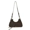 Bolsa tiracolo simples estilo coreano Bolsa Dumpling para mulheres Inverno 2025 Nova Luxo Acessível Cor Contrastante Textura de Alta Qualidade Bolsa de ombro único Transversal