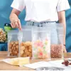 Bolsa de Sello de Ocho Lados de Alta Transparencia al por Mayor del Fabricante Bolsa de Empaque de Alimentos Estéreo 3D Fruta Seca Flor Té Cereal Plástico Bolsa de Pie