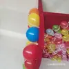 Monta un Puesto con Globos y Pistolas para Disparar Globos con Dardos y Balines