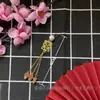 Novia China Boda Hecho a Mano DIY Accesorios Antiguo Tuan Xi Fan Decoración Colgante de Taza de Té Material de Borla Xi Zi