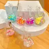 Adorno pequeño de pez marino acrílico, llavero de pez de océano, colgante creativo de botella de arena líquida de pez payaso, decoración de bolsa al por mayor