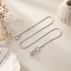 Novo design outono e inverno S-buckle colar com pingente de pérola acessório para mulheres, estilo de luxo leve, corrente de osso de cobra de nicho de alta qualidade