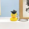 Chaveiro Pingente Criativo Variado Pato Amarelo Resina Pato Presente de Formatura Estudante Caixa Surpresa Buraco Música