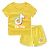 2023 Verão Infantil Gola Redonda Camiseta Calças Quentes Coreano Casual Base Camisa Suor-absorvente Doce Conjunto de Camiseta Infantil