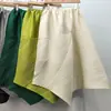 Saia Irregular Miyake Verão 2026 Nova Cintura Elástica Solta Comprimento Médio Elegante Versátil para o Trabalho
