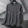 Camiseta casual versátil de manga larga para hombre para otoño, cuello redondo, camiseta básica de color liso de moda, cómoda, transpirable, top de corte holgado