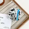 Duowei joyería ácido acético FRANCIA Etiqueta Dorada sentido de alta gama gato Mini pinza pequeña de agarre pinza lateral flequillo pinza pequeña