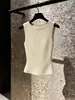 Chaleco de punto color albaricoque con tirantes, un nuevo top de moda de verano para mujer, adecuado como prenda exterior, estiloso y elegante