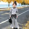 Conjunto de Moletom Cardigan com Laço Estilo Coreano para Meninas, Saia Xadrez e Calça Flare, Novo Conjunto de Duas Peças 2026
