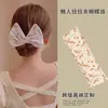 Moda de celebridad de internet banda giratoria para el cabello femenina moño de moño de pelo de moño perezoso clip de torsión mágica rizador de pelo perezoso al por mayor