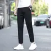 Loja de outlet de comércio exterior calças casuais cropped masculinas primavera-verão para pessoas de baixa estatura, calças retas slim fit ligeiramente afuniladas, calças longas finas, calças masculinas de 9 pontos