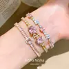 Pulsera geométrica de flor de zirconio con cierre de broche, europea y americana, pulsera vintage de nicho de alta gama, joyería versátil y elegante para mujer