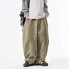 Pantalones de trabajo de mezclilla lavada estilo retro americano, unisex, con un diseño minimalista, corte holgado y estilo de pierna ancha