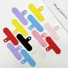 Cordón para teléfono de color caramelo, almohadilla de silicona, clip trasero transparente, tarjeta de tela fija, almohadilla para teléfono con puerto de carga universal