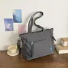 Bolsa de mano casual lisa transfronteriza, estilo nuevo, gran capacidad, adecuada para ir al trabajo, simple y ligera, se puede llevar al hombro o cruzada