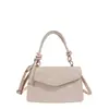 Bolso de mujer de nicho nuevo con un diseño único, bolso cuadrado pequeño con un toque retro, bolso de hombro, bolso de axila, bolso de mano simple