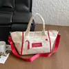 Bolsa de lona transfronteiriça para mulheres, bolsa de grande capacidade para o dia a dia, nova versão coreana de verão, bolsa de mão casual, bolsa de ombro, bolsa transversal