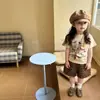 Camisetas para niños y niñas ropa de verano 2026 nuevo moderno genial moda estampado de grafiti popular manga corta pantalones cortos conjunto de dos piezas