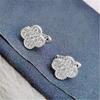 Pendientes de alta gama con diseño de trébol de cuatro hojas y diamantes para mujer, ligeros, de lujo, estilo francés, estilo frío, con flores de té.