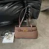 Bolsa de Axila Shuai Mijia Feminina 2026 Outono Novo Estilo Nicho Casual para o Dia a Dia Bolsa de Ombro Única Tendência Elegante Bolsa de Mão