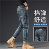Jeans azul vintage de alta qualidade para homens, corte slim, estilo americano moderno, calça comprida elástica, novo modelo versátil para a primavera de 2026