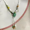 Collar con colgante de campana de mariposa de cerámica de estilo étnico retro para mujer, diseño nuevo y moderno, cadena larga para suéter, accesorios
