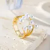 Anillos de perlas al por mayor, líneas de oro electrochapado europeas y americanas, diseño hueco abierto, joyería de diseño original a la moda, pulseras al por mayor