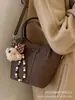 Bolso de Mano Pequeño de Moda y Tendencia para Mujer 2026 Nuevo Modelo Bolso Cruzado Exquisito y Versátil con un Toque de Lujo Bolso de Hombro Único Bolso Tote Pequeño