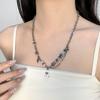 Collar de cadena metálica de puntada de cadeneta de monstruo fantasma pequeño blanco y negro para hombre y mujer, sentido de alta gama, nicho, personalidad, temperamento, cadena para clavícula