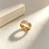 Área do anel alto luxo clássico aço titânio banhado a ouro real 18K suporta uma geração de cabelo