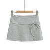 Saia Curta Doce Estilo Coreano com Laço para Mulheres Primavera e Verão Novo Design Nicho A-Line Cintura Alta
