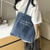 Bolso de lona de mezclilla estilo americano vintage, bolso de hombro bordado de gran capacidad, bolso de mano versátil para estudiantes y para ir al trabajo