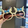 Gafas de sol infantiles Kolomi lazo dibujos animados moda visera gafas transfronterizas foto cóncavas gafas de sol niños y niñas