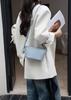 Super Popular Exquisite Bolsa para Celular Pequena Bolsa para Mulheres 2025 Nova Bolsa de Bolinho de Couro Genuíno Versátil Mini Bolsa Transversal Bolsa de Balde