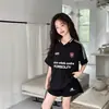 Conjunto de Camiseta Estilo Americano para Niñas 2026 Verano Nuevo Estilo para Niños Mayores, Top de Manga Corta con Cuello en V y Letra y Pantalones Cortos Conjunto de Dos Piezas para Verano