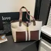 Bolso Tote de Lona Patchwork Estilo Nuevo 2026, Bolso de Mano de Alta Gama para Viajes Diarios, Diseño de Nicho, Maletín de Hombro de Gran Capacidad