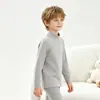 Ropa interior térmica para niños Otoño e Invierno Nuevos Tops de Cuello Alto de Lana para Niños y Niñas Capa Base sin Costuras Cepillada por Ambos Lados