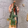 Nuevo Colgante de Bolso Bean Bear Llavero de Cuero Lindo Colgante de Llave de Dibujos Animados Exquisito Pequeño Regalo Venta al por Mayor