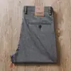 Estación europea verano Tencel lino mezclado antiarrugas sin planchado ligero transpirable para hombre de negocios rectos holgados casuales