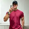 Camiseta deportiva de manga corta de algodón puro de marca moderna para hombre, cuello redondo, ropa casual de entrenamiento para fitness, top transpirable, estilo americano para hombres jóvenes, verano