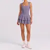 Falda corta de tenis sin espalda estilo europeo y americano, tacto nude, ajustada, anti-exposición para mujer, nueva falda corta transfronteriza para correr al aire libre, fitness, yoga