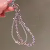Colgante de Perla de Cristal Suave y Elegante Cadena para Teléfono Móvil Llavero de Nudo de Lazo Estrella de Cinco Puntas Cadena Doble Accesorios Modelo Nuevo 2026