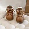 Zapatos peludos casuales simples para niñas 2025 Invierno Nuevo Botas de nieve de terciopelo engrosadas Botas de algodón de moda del noreste