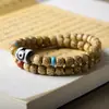 Pulseiras Ecológicas Originais Atacado para Transmissão ao Vivo, Pulseiras de Sementes de Bodhi Estrela e Lua Sementes Douradas, Itens de Jogo Cultural Estilo Étnico, Contas e Joias Budistas