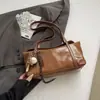 Bolso de axila de nicho estilo coreano para mujer, nuevo bolso tote retro de moda 2026, bolso de hombro simple y de gran capacidad para el trabajo